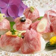 【サービス】石焼￥8800円以上のコース料理で　「人気の手まり寿司２個）サ－ビス」