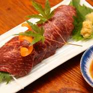 県産の馬肉をにんにく、しょうが、ごま油で