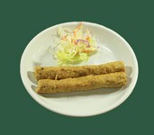 ポークの挽き肉を串にまきつけ焼き上げたもの