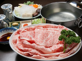 「焼しゃぶ」と「かに甲羅焼き」の逸品料理が含まれる「しあわせコース」