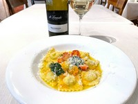 Homemade ricotta and spinach ravioli