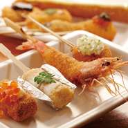 四季折々の串カツ約40種の中から、本日おすすめの串カツをお選びし、揚げたてにてお持ちいたします。
