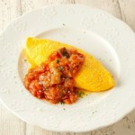 チーズ入りのとろける味わいのオムレツ。うにソースにうにやイクラをトッピングして贅沢な逸品。