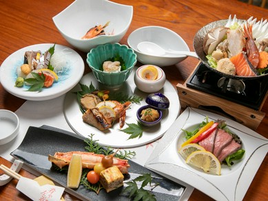 バリエーション豊富な料理を囲んで盛り上がる歓送迎会