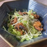 熱々のタコの唐揚げをサラダに合わせて温製風に。柚子醤油のドレッシングとアクセントのごま油がベストマッチです!