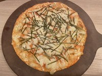 パリッと薄焼きしたピザ。熟成明太子のコクがたまらない！