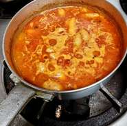 フランベしたのち、アラビアータに。トマトベーシックも追加。