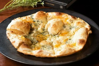 季節によって替わるチーズのハーモニー『クアトロフォルマッジ』