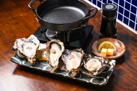 新鮮な生牡蠣を、お客様の目の前でバター醤油で焼き上げる贅沢な逸品です。