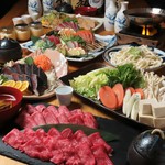 2時間飲み放題付きのコースです。鮮魚の刺身4種盛り合わせやレア帆立と国産牡蠣のフライ、すき焼きなど♪