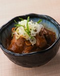 大鍋で作るこってりホルモン煮込みはプリプリの食感をお楽しみいただけます｡