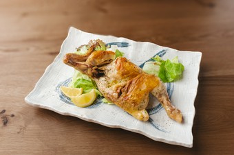 丸鶏の半身焼き