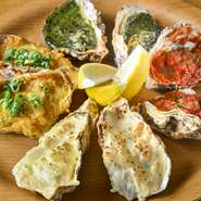 一つ一つ丁寧に仕上げられた『焼き牡蠣4種盛り』。グラタン、味噌マヨ、バジル、ピリ辛トマトの4種類が揃い、見た目にも華やかです。特に人気なのは、香ばしい味噌マヨ。単品でも楽しめます。ワインとの相性も抜群。