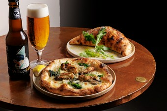 牡蠣の旨みとチーズのコク。一番人気のピッツア『牡蠣のピッツア』