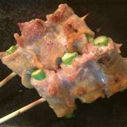 アスパラを豚バラで巻いた串。