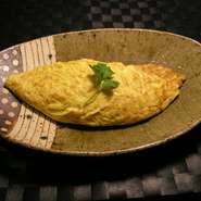 島にんじんのオムレツになっております。トロふわのタマゴと島にんじんのシャキシャキ感が絶妙です