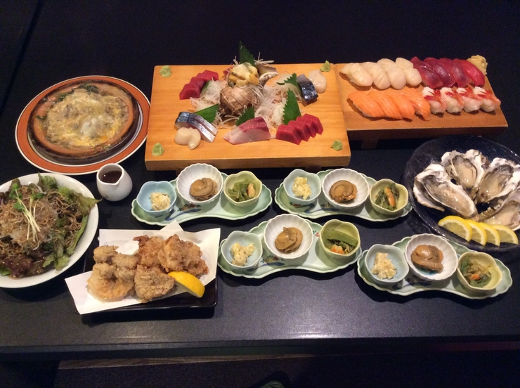 For 4 people! A very reasonable and enjoyable set meal including oysters, sashimi, zangi, etc.