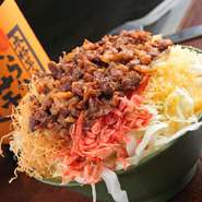 じっくり煮込んだ自家製の牛筋がたっぷり入ったもんじゃ。口の中に入れた瞬間ほろりととろける牛筋が絶品です。