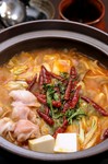 地鶏と和牛モツのトマト鍋のコース