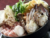 豚肉、かに、野菜がたっぷり入った鍋です。