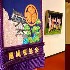 店内には自身の写真や化粧まわしが飾られています。