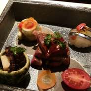 ～春～細魚年輪揚げ・飯蛸と新筍の煮物・きびなご手まり寿司・「アイコ」トマト・薩摩黒牛ヒレ炙り