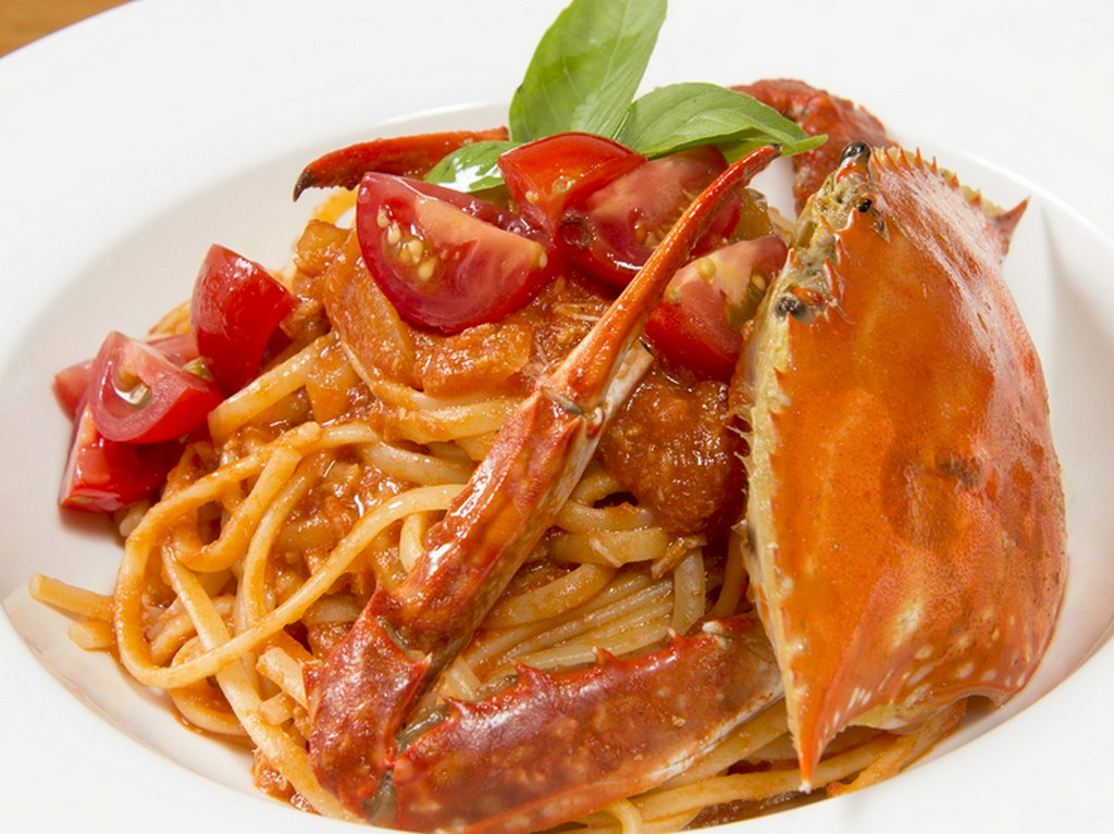 一匹まるごとのいただける『ワタリガニのトマトソースパスタ』