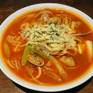 海鮮と深谷ネギのトマトスープスパゲッティ～チーズを乗せて～