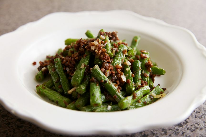 四川の漬物の風味が利いた『インゲンと漬物炒め』