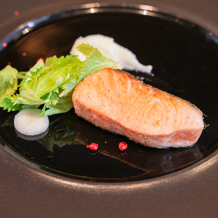 April's recommended steak course: "Pan-seared Norwegian salmon with celeriac puree and celery salad"