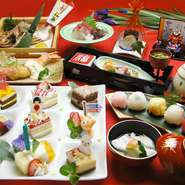 先付/お造り/焼物(鯛の姿焼)/揚物(有頭エビ/ポテト/ウインナー)/蒸物(茶碗蒸し)/手毬寿司/汁物(若竹)/デザート(フルーツとミニケーキのプレート)選べるおもちゃ付［ケーキの飾りは変わることもあります］