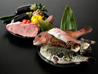 季節の移り変わりに花を添える旬の野菜と黒毛和牛のロースと鮮魚