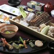 季節を映す日本料理は、人生の節目の日を祝うのに最適です。縁起物の鯛を使ったお祝いプランや、目の前で絶妙なタイミングで揚げた天ぷらを味わうコースなど、お好みに合わせた料理が選べます。
