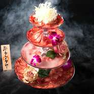 SNS映え必至の名物・牛タンタワー！見た目も豪華な料理を囲んで語らいのひとときをお過ごしください。3段 4980円 / 4段 6980円