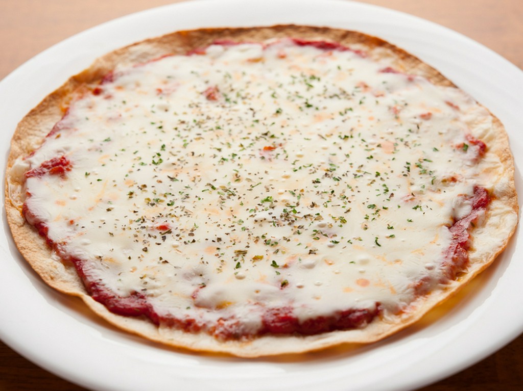 独自の職人技を駆使した生地、ソース、焼き方がオリジナルな定番ピッツァ『マルゲリータ』