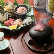 和歌山県煙樹が浜の天然石を熱し、食材を焼いて味わう『石焼き』。遠赤外線効果でふっくらとした焼き上がりになり旨味を逃しません。目の前で焼く臨場感と非日常感が、楽しいデートのひとときを演出します。