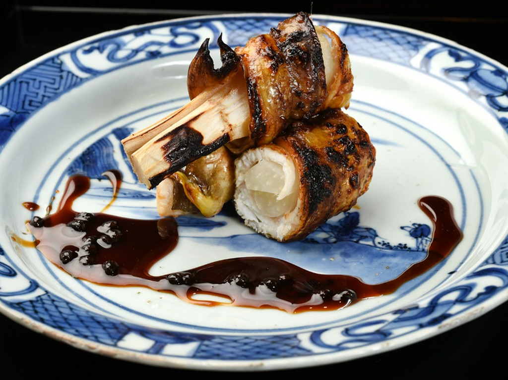 『穴子と独活の八幡巻』※画像は一例です。季節に応じて食材や調理法は変わります。