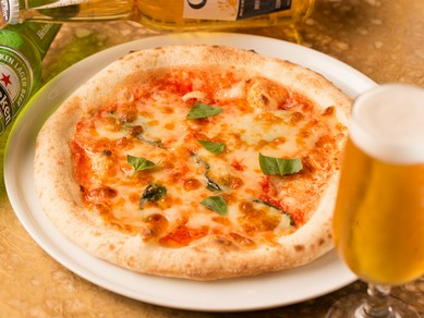 トマトソースとチーズ、バジルのシンプルピッツァは人気Ｎｏ1『ピッツァマルゲリータ』