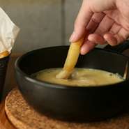 Potato and cheese gratin fondue