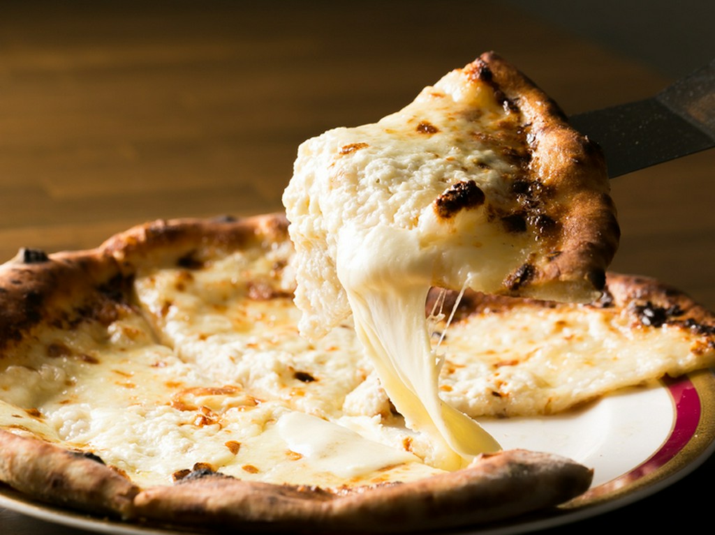 開店当初から人気。店の看板メニュー『クワトロフォルマッジ』