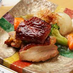 香ばしさと地鶏ならではの弾力を愉しむ『くわ焼　名古屋コーチンくわ（もも肉）』