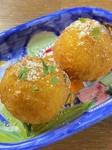 サフランリゾットに広島牛煮込みとモッツァレラチーズを詰めたもの。