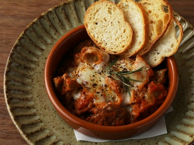 長野の郷土料理を洋風にアレンジした『おたぐり（馬モツ）のトマト煮込み』