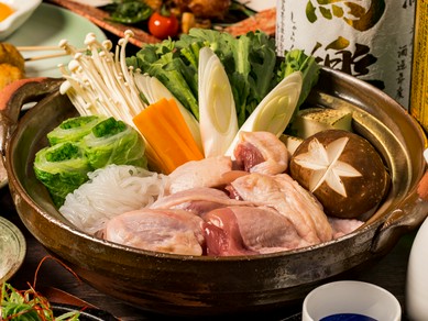 自慢の名古屋コーチンを使ったすき焼き鍋を食してください