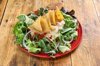 自社農園「東北牧場」の無農薬野菜を使ったオリジナルタコライス
