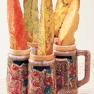 もう1つの人気のメニューがバゲットです。酪農、アンチョビ、明太子、ガーリック、はちみつの定番の5種類のバターの他に、期間限定の今月のバターがあるので、いろんな味が楽しめます。