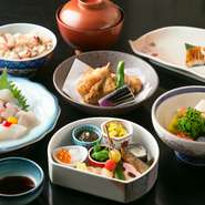 明石の鮮魚を中心とする地物食材、全国の旬の味覚を巧みに組み合わせ、彩り・香り・味わいともに幸せを感じる会席に。5000円、6000円、7000円(税込)の3種に加え、ご予算に応じたアレンジも可能。写真は一例。