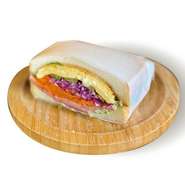 当店イチオシ！シュガーバターで焼いたパンとグリーンペッパーソースの効いたローストポークのサンドイッチ。