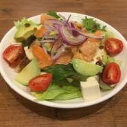 Carpaccio with Tofu,avocado,prosciutto and green salad