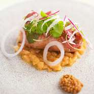 『自家製糸島産豚のサルシッチャとスパイシーな豆の煮込み』